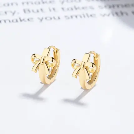 Elegant Mini Glitzs 925 Silver Huggie Bow Earrings in Gold Finish
