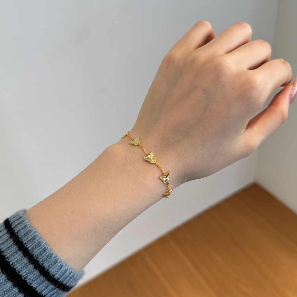 Elegant 14K Gold Plated Butterfly Charm Bracelet with Dazzling CZ - Image 2